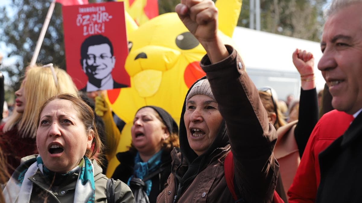 Jailed Erdogan rival clashes with judge as Turkey corruption trial begins