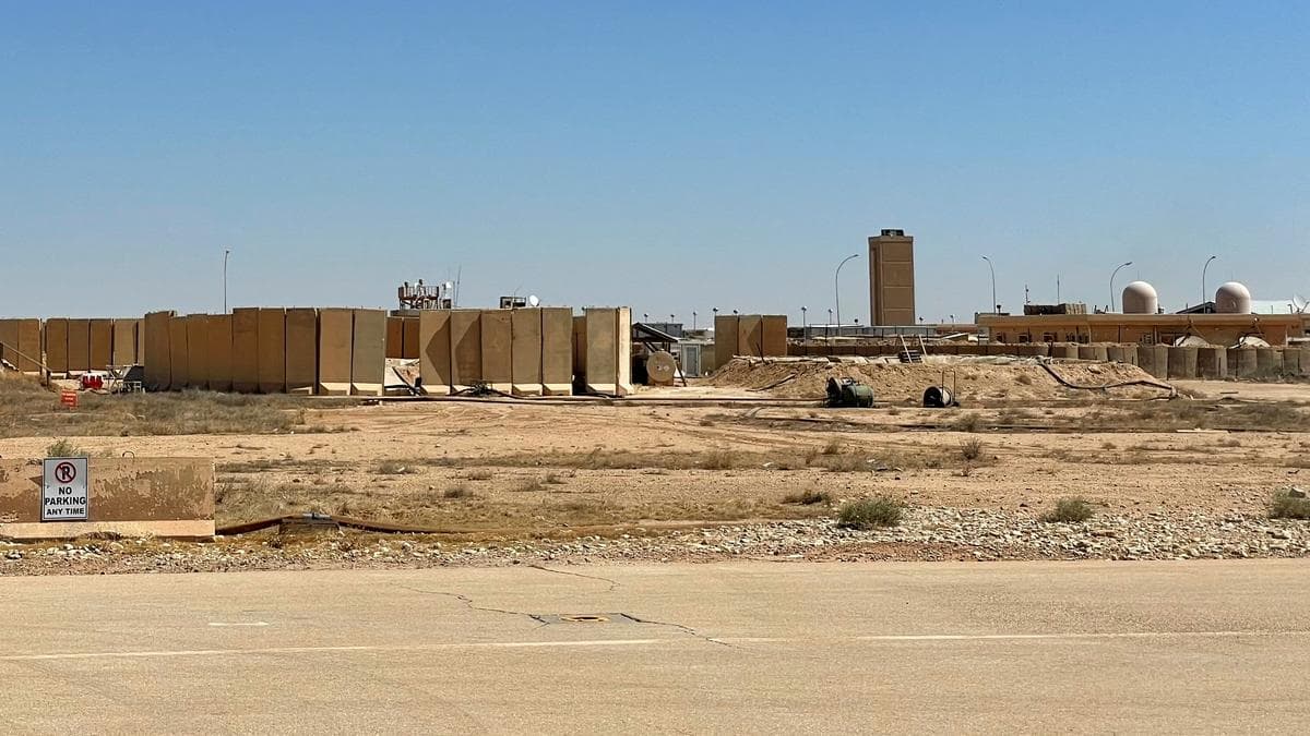 As the last U.S. troops pack up in Iraq, militias signal their weapons will stay
